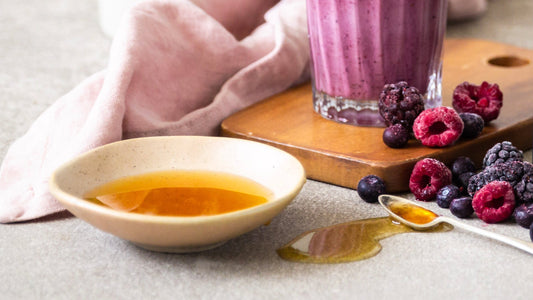 small dish of honey and berries