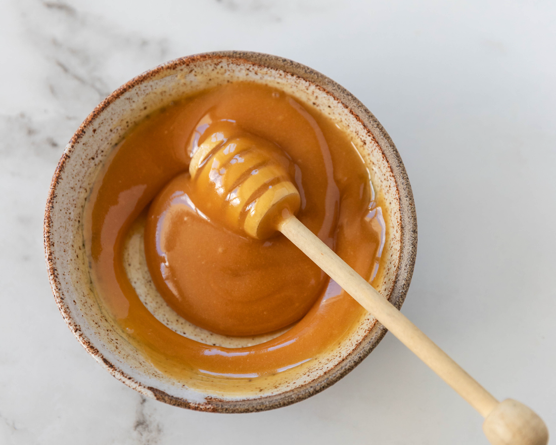 Taylor Pass Honey Manuka honey, swirled in a bowl