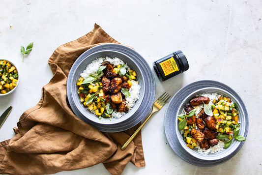 salmon bowls with a jar of honey